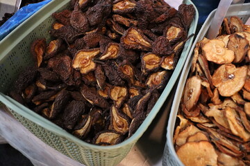A Vibrant and Colorful Array of Dried Fruits Arranged in Baskets at the Local Market