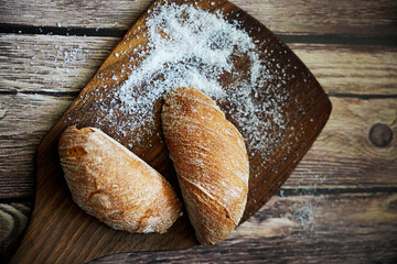 Freshly Baked Bread Rolls on Wooden Board