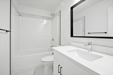 Bathroom with a white toilet and sink