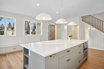Kitchen with a white island and a white countertop