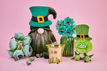 cute leprechaun and his friend fluffy put on hats, took a golden bucket for good luck, glass balls,...