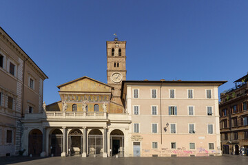 Fototapeta premium Medieval Basilica Santa Maria on Piazza di Santa Maria in Trastevere in Rome, Italy
