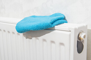 Blue cloth on the heater radiator. Clean radiator