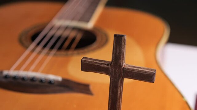 Wooden cross and acoustic guitar symbolizing faith and music christian, crucifix