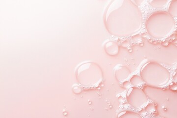 Abstract Bubbles on Pink: A delicate composition of glistening, transparent bubbles resting on a soft pink background. This minimalist abstract image evokes a sense of purity, freshness.