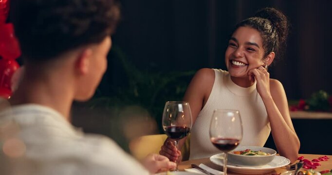 Happy, couple and talking on date at restaurant with romance, valentines day celebration and fine dining. Smile, people and communication for anniversary, commitment and roses of hospitality service