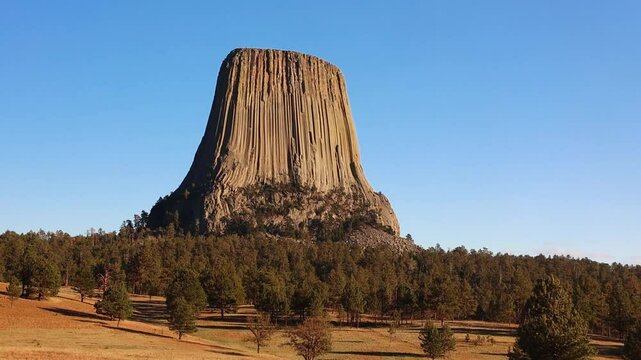 Devils Tower in Crook County with slow panning motion. Wyoming. Devils Tower National Monument was the first United States national monument.
