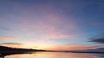 Vibrant Evening Sky Reflected in Still Water