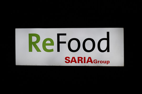 Germany, Paderborn, February 07. 2025, sign or lettering by night of ReFood Saria Group, a disposer and recycler of food waste, frying fats and grease separator contents
