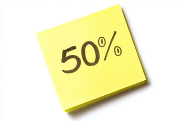 Bright yellow sticky note displays the text 50 percent indicating a discount or completion status