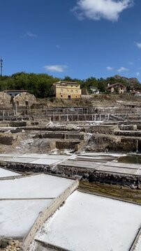 Inland salt pans of Anana, threshing floors full of salty water evaporating in the sun, salt production in inland salt mines in the Anana Salt Valley, Alava, Spain