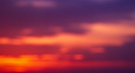 Obraz premium Fiery Sunset Sky Abstract with Orange and Purple Clouds