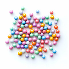 Colorful candy sprinkles scattered on white. Food photography for recipe blogs
