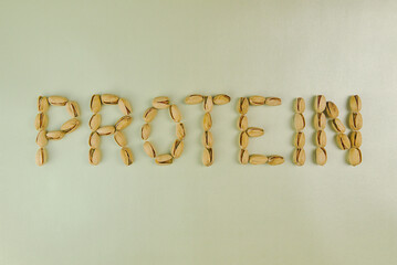 La palabra Proteína escrita con pistaches