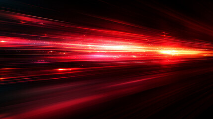 A dynamic red light streaks across a black background, symbolizing speed and technological advancement. This motion blur captures the essence of rapid movement, chaos, and futuristic energy.

