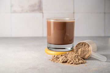 Protein powder and protein drinks, with scoops. Food supplement, bodybuilding. copy space