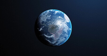 Earth in space with clouds and continents visible, highlighting global beauty