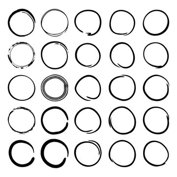 Collection of manually hand drawn circles with interdigitated lines