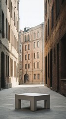 Fototapeta premium Concrete table stands in an alley surrounded by buildings