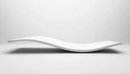 Obraz premium A minimalistic curved white shelf against a bright white backdrop