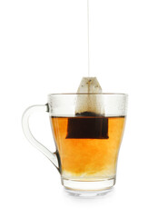 Cup with teabag isolated on white. Brewing aromatic tea