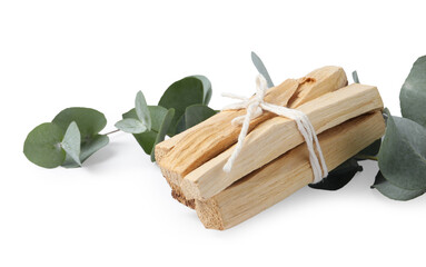 Palo santo sticks and eucalyptus branches isolated on white