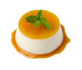Tasty pudding with caramel sauce and mint isolated on white