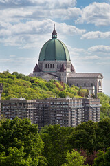 Stunning view of Saint Joseph's Oratory, an iconic basilica in Montreal, Canada, with its green...