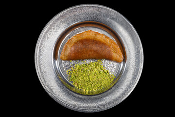 Traditional Turkish dessert called Arab Kadaif or tas kadayif. Turkish Dessert Tas Kadayif with...