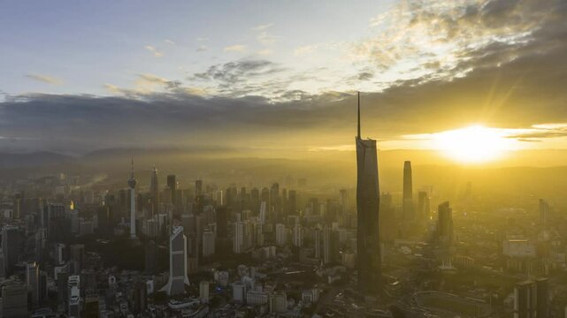 Aerial view time lapse 4k video of Kuala Lumpur city center view during dawn overlooking the city skyline in Federal Territory, Malaysia. 