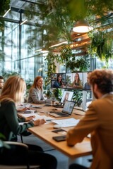 Team video conference in a modern, plant-filled office. Diverse group of professionals collaborate.