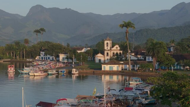 Paraty, a charming historic city, enchants with its preserved stone streets and a marina full of traditional boats, which reflect the rich local maritime culture.