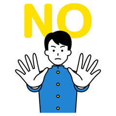 両手を前に出してNOと言う男子学生