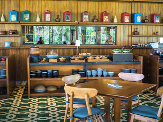 Interior of a traditional urban restaurant, with an old-fashioned feel, all-wood furniture