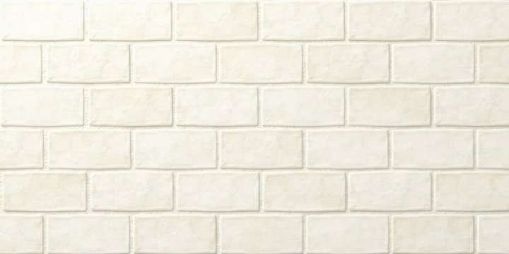 Fototapeta Cream-colored rectangular tiles arranged in a classic brickwork pattern, offering a clean and simple background texture for design projects