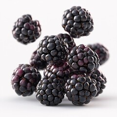 A Cluster of Ripe Blackberries Falling Softly