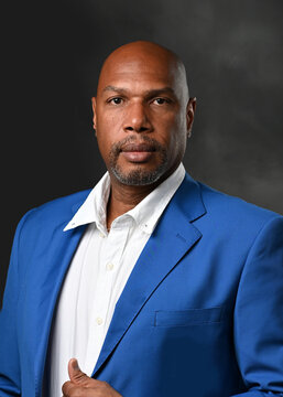 portrait of a handsome man in royal blue business jacket
