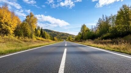 Fototapeta premium Scenic Road Through Colorful Autumn Trees Under Blue Sky with Clouds : Generative AI