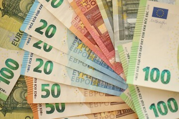 Pile of euro paper banknotes as finance background