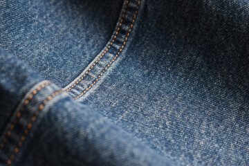 seam of blue denim texture background, jean fashion style