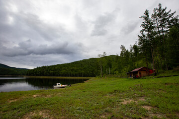 Protected Russia. The cordon of the Zeisky Reserve on the lake shore.