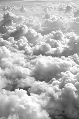 Aerial view of fluffy white clouds in black and white : Generative AI