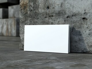 Blank brochure mockup on a grunge concrete background.