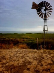 windmill near the ocean