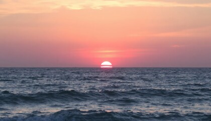 Serene Ocean Sunset with Vibrant Sky and Tranquil Waves