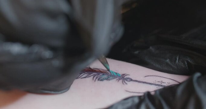 Closeup of Tattoo Being Filled in with Color