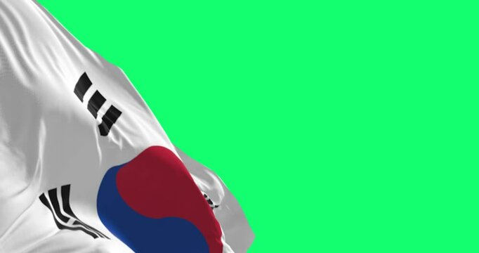 Close-up of South Korea national flag waving isolated on green background