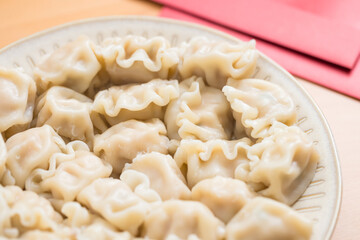Lunar new year dumplings with red packet tradition