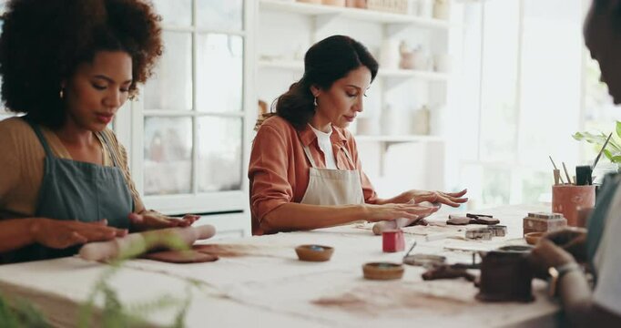Pottery, art and group of women in studio, workshop or shape process for handmade ceramic design. Craft, hobby and artist people with clay, unique artwork and creative class with sustainable learning