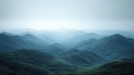 Fototapeta premium Serene Mountain Landscape with Layers of Blue Hues and Misty Background, Ideal for Nature Themes